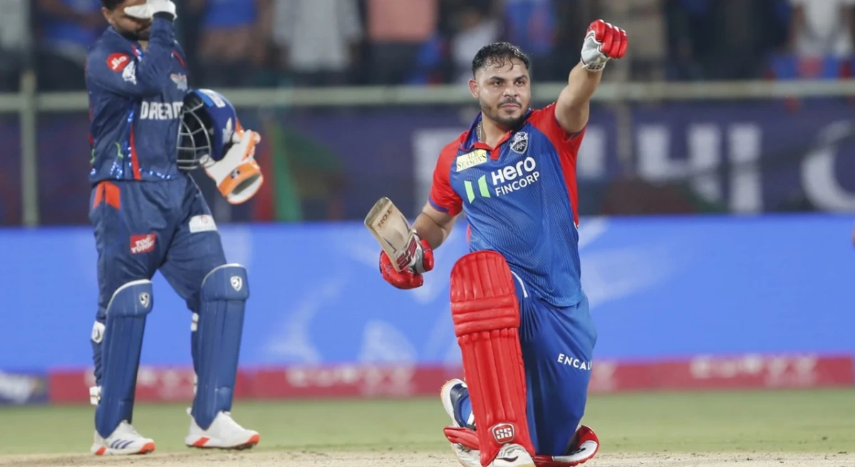 Ashutosh Sharma celebrating his century for Wigan Cricket Club during a match against Formby CC in the Liverpool League 2025